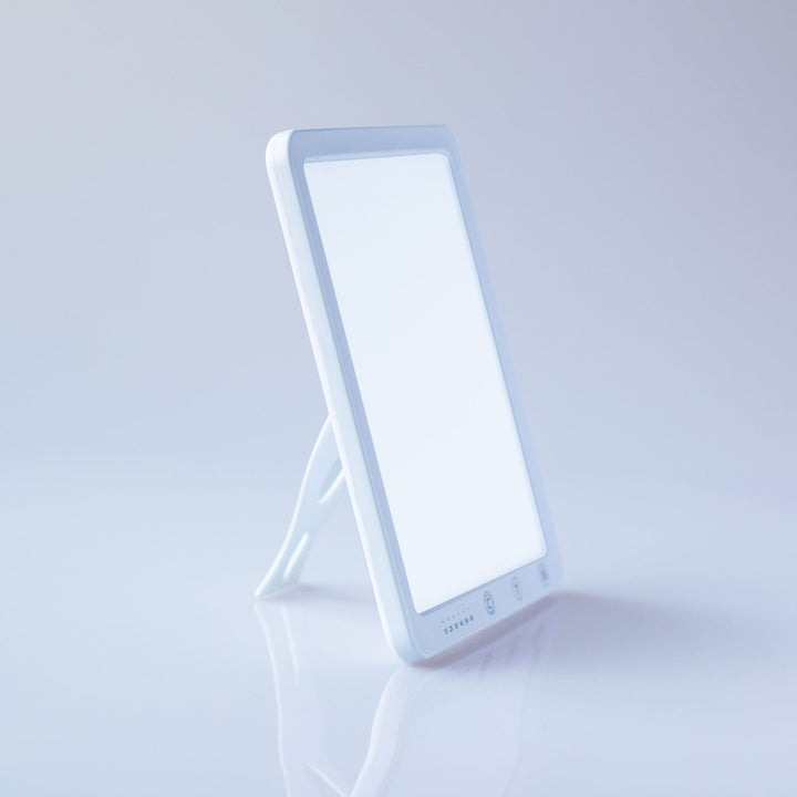 Lumiram HappyMood Bright Light Therapy Lamp for SAD, sleek white design with adjustable stand.