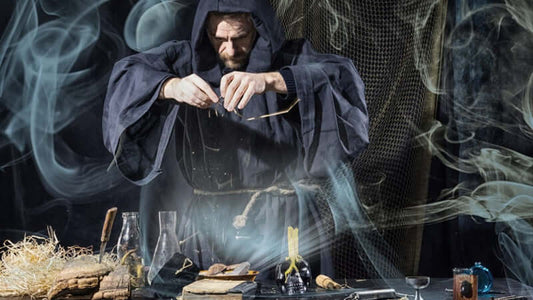 A mysterious figure in a dark robe practicing a New Kind of Alchemy amidst swirling smoke and mystical tools.