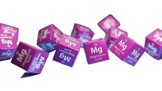 Colorful magnesium cubes representing Magnesium and Glutathione in a scientific context.