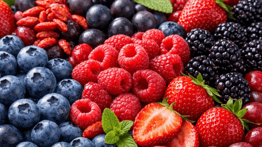 A colorful assortment of the healthiest berries including blueberries, raspberries, strawberries, and blackberries.