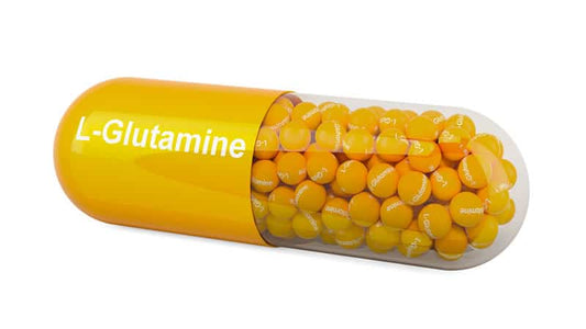 L-Glutamine supplement capsule filled with yellow tablets, highlighting amino acid for body repairs.