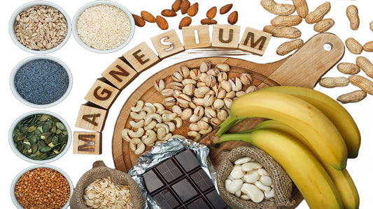 Assorted foods rich in magnesium, including nuts, seeds, bananas, and chocolate, highlighting magnesium for health.