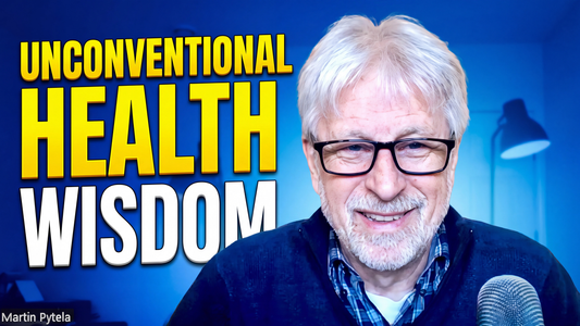 Martin Pytela sharing unconventional health wisdom with a smiling expression and blue backdrop.