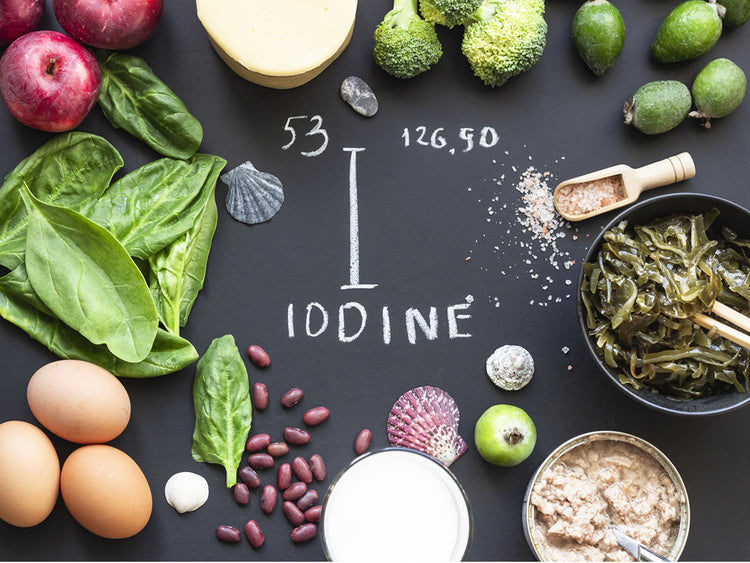 Iodine rich foods including spinach, eggs, seaweed, and apples for thyroid and energy support.