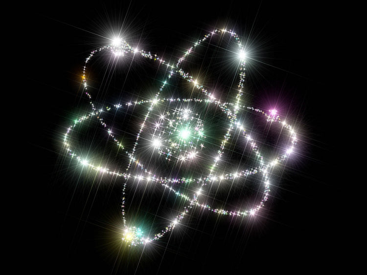 A sparkling representation of atomic structure, symbolizing the essence of ORMUS - Alchemical Elixirs for Higher Consciousness.