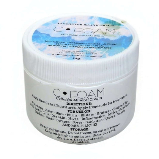 white jar with black text and blue sticker on top, Vancouver Island C-Foam colloidal mineral cream, 100% natural, sustainably sourced, alkaline, sodium free, GMO free, vegan, no harmful chemicals or preservatives, made entirely from Pacific Ocean water, 26g shows Directions for Use and Storage