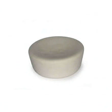 Crystal Cupcake top view of a smooth, round, light-colored cake layer.