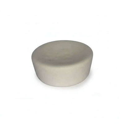 Crystal Cupcake top view of a smooth, round, light-colored cake layer.