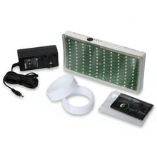 Portable Infrared Light Therapy device with accessories, including power adapter and treatment pads.