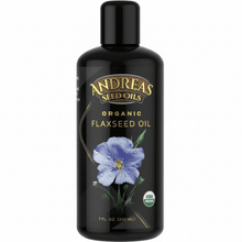 Cold Pressed Flax Oil by Andreas Seed Oils in a 7 fl. oz black bottle with a blue flower design.