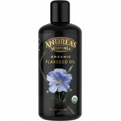 Cold Pressed Flax Oil by Andreas Seed Oils in a 7 fl. oz black bottle with a blue flower design.
