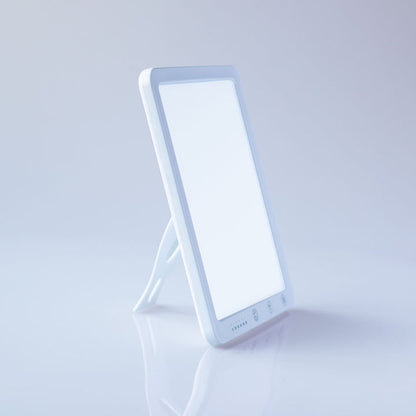Lumiram HappyMood Bright Light Therapy Lamp for SAD, sleek white design with adjustable stand.