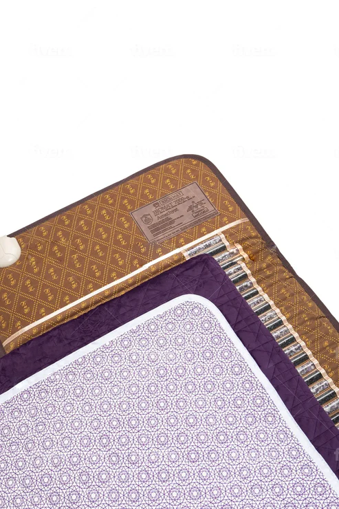 Close-up of a patterned fabric with a visible brand label on a white background