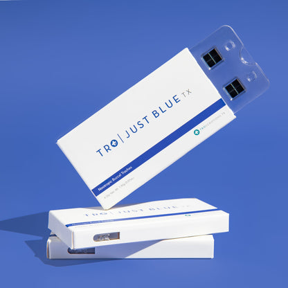 Just Blue Buccal Troches for Mental Focus packaging displayed in an appealing way on a blue background.